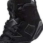 Black high-top sneaker with gray accents on a white background